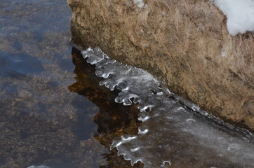  tracery edge of ice on a rock
