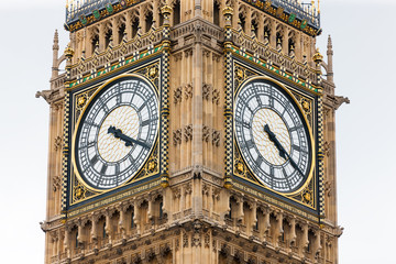 Fototapeta na wymiar Two clock faces of Big Ben Clock Tower, iconic gothic landmark in London, England