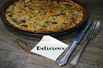Mushroom quiche on wood