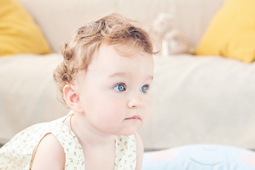 beautiful baby playing in the room