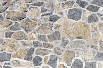 Wall murals Stones Background of stone wall texture photo