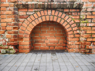 Arch in the brick wall of a medieval Lithuanian castle