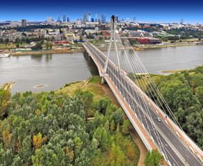 Poland, Mazovia province, Warsaw - 2012/09/01: Panoramic view of the city center with the Swietokrzyski Bridge over Vistula river