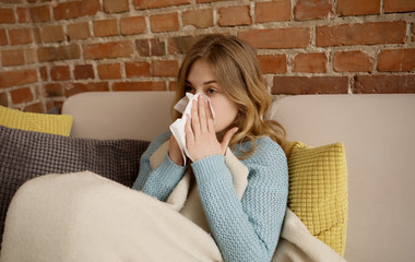 Young woman with cold, flue.
