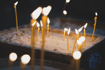 Candles burning in church