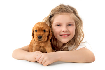 Little girl with red puppy isolated on white background. Kid Pet Friendship