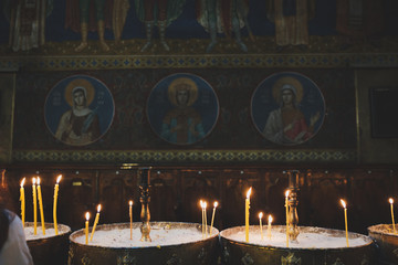 Candles burning in church