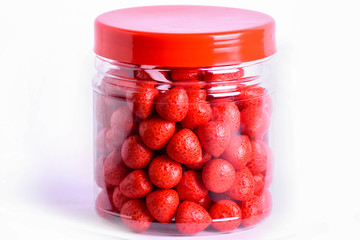 Colorful background of assorted Gumballs isolated over white background