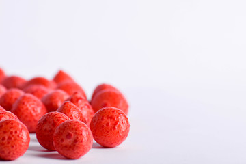 Colorful background of assorted Gumballs isolated over white background