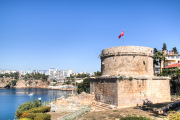 The historical tower near the sea in the center of Antalya in Turkey
