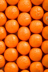   Colorful background of assorted Gumballs isolated over white background