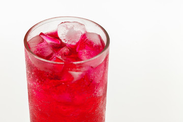 Summer cocktail; fresh juice with sparkling on ice on white background