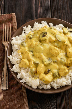 Chicken with mushroom in curry cream sauce.