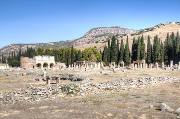 The ruins of the ancient Hierapolis city next to the travertine pools of Pamukkale, Turkey
