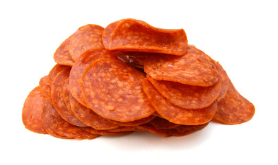 lices of pepperoni on white background - 184286756