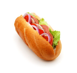 sandwich with ham, cheese, tomatoes, red onion and lettuce. Isolated on white