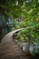 A path past a mountain lake.