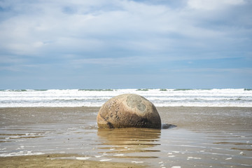 The Moeraki Boulders are lying along the Koekohe Beach on the Otago coast of New Zealand. © Robert CHG