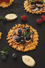 Waffles with fruits, breakfast background