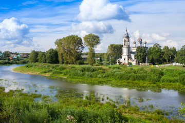Fototapeta na wymiar River Vologda and church of the Presentation of the Lord was built in 1731-1735 years in Vologda, Russia