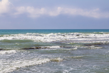 Fototapeta na wymiar Blue sea on sunny day
