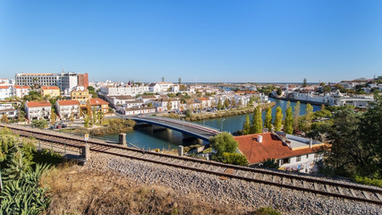Obraz premium Aerial. The town of Tavira on the River Arade and railroad.