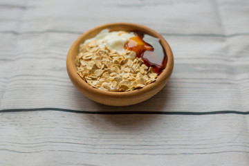 Muesli isolated on white background with jam