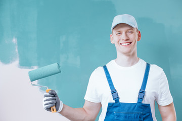 Painter holding roller