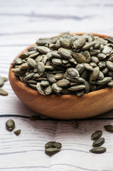 Raw pumpkin seeds, food background, 