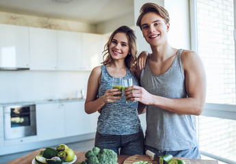 Sporty couple with healthy food