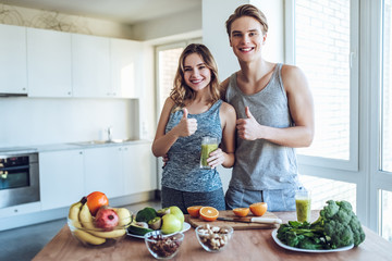 Sporty couple with healthy food