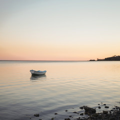 Small Boat on Gently Lapping Water