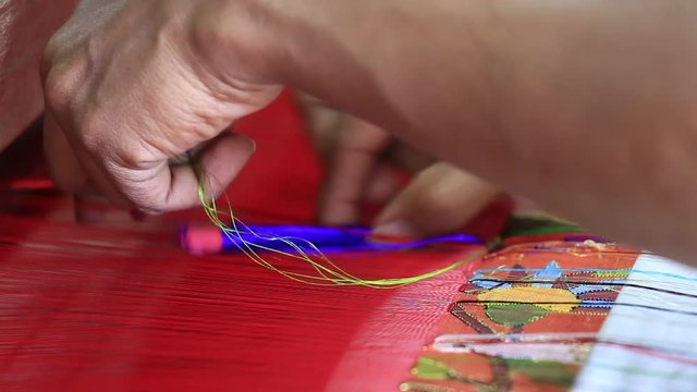 Indian local man makes a Pashmina Shawl the traditional way in Aurangabad, Maharashtra province. India