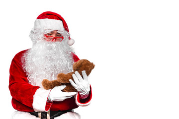 Santa claus have a teddy for children,merry christmas,Gifts for Children,Portrait of santa claus on white background,December is the month of Christmas.