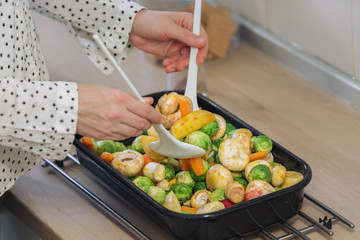Pregnant woman preparing healthy vegetable meal