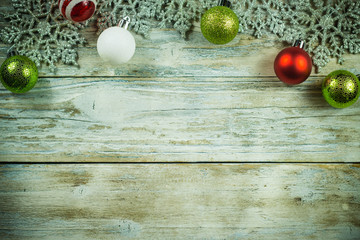 Naklejka na ściany i meble Christmas Ornaments on Vintage Wood Background