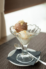 Chocolate and vanilla ice cream in a glass vase