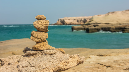 Fototapeta na wymiar View of the rocks at the coast of the Persian Gulf