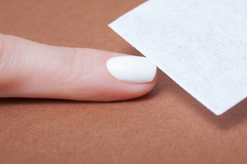 Manicure in beauty salon. Finger closeup 

