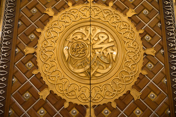 	MEDINA, SAUDI ARABIA - 15TH NOV 2017; Close view of door for Mosque Al-Nabawi in Medina, Saudi Arabia. It is the second-holiest site in Islam and the mosque was built by Prophet Muhammad in 622
