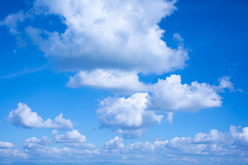 The white cloud on the blue sky in the bright day is suitable for being the nice background from the view of the highest point of Thailand. There are mountains being far at the below of the pic.