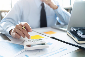 auditor or financial inspector working on business report