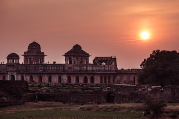 Mandu India, afghan ruins of islam kingdom, mosque monument and muslim tomb. Colorful sky at...