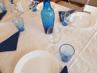 Modern glasses on a set table. View 7