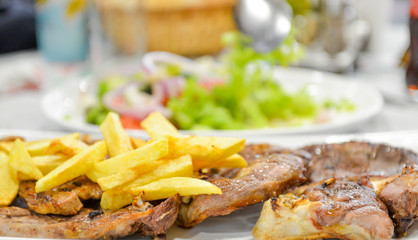 roasted beef and lamb served on a restaurant table