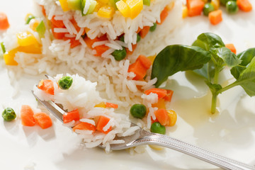 Vegetarian food, rice salad with vegetables, healthy meals