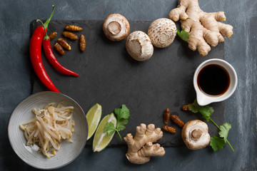 Ingredients for spicy asian food with fried insect