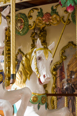 City colorful traditional french carousel for children, horse for riding