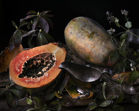 Close-up of papaya against black background

