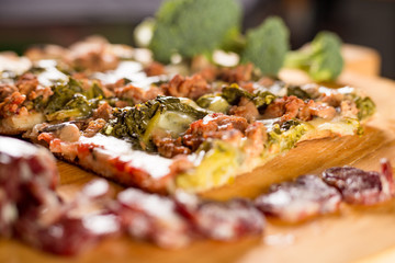 Pizza with broccoli and sausage
